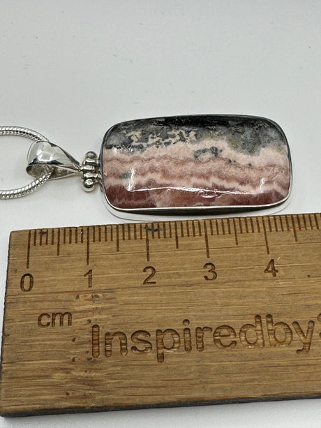 Rhodocroscite Silver Pendant- "My mind, body, and spirit are protected and grounded."