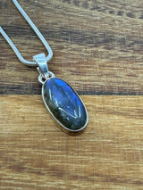 Labradorite Silver Pendant - “I welcome change and transformation into my life”.