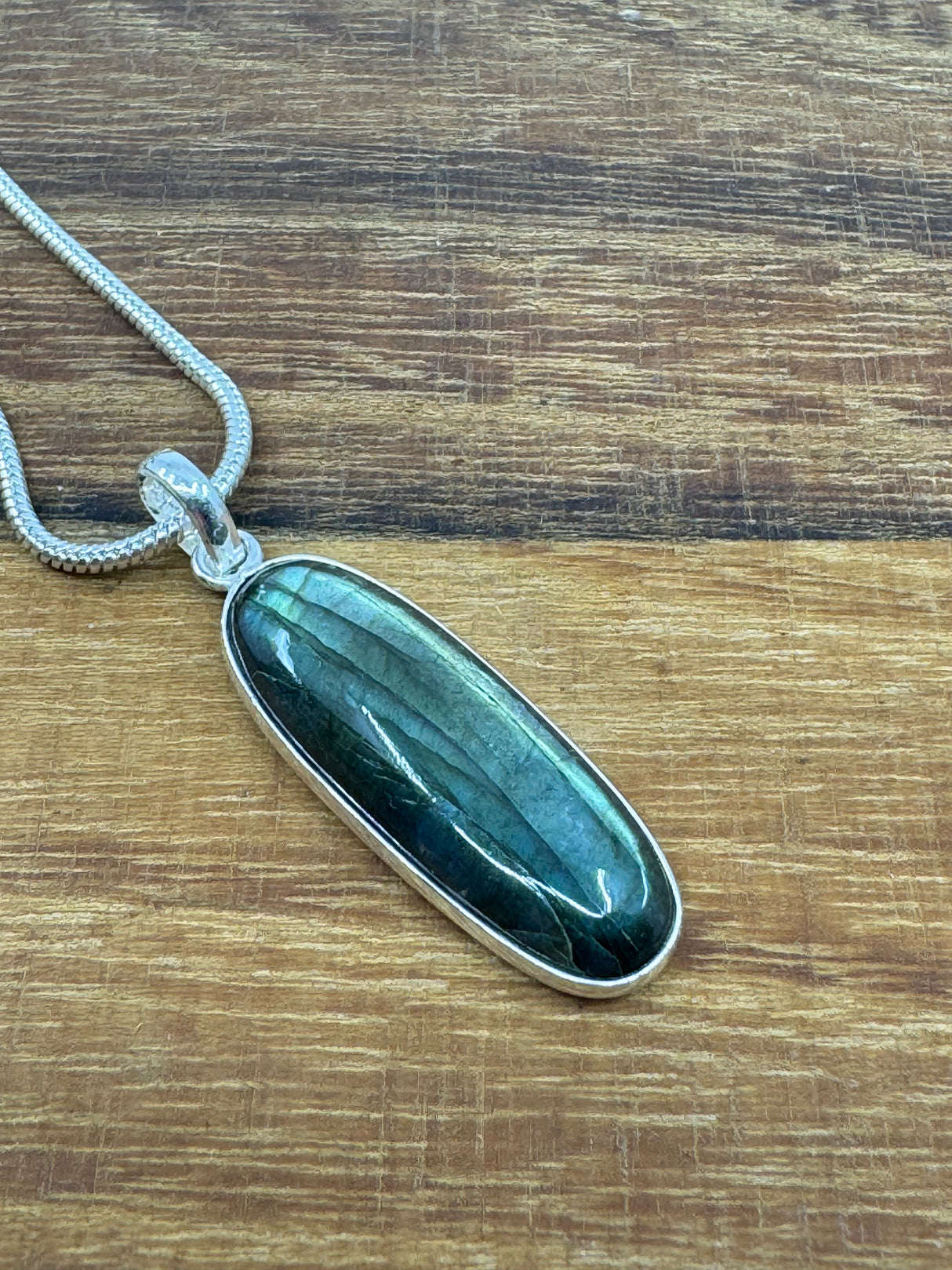 Labradorite Silver Pendant - “I welcome change and transformation into my life”.