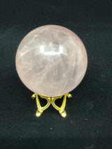 Rose Quartz Sphere on Crown Stand 95g- “I radiate love, beauty, confidence and grace”.