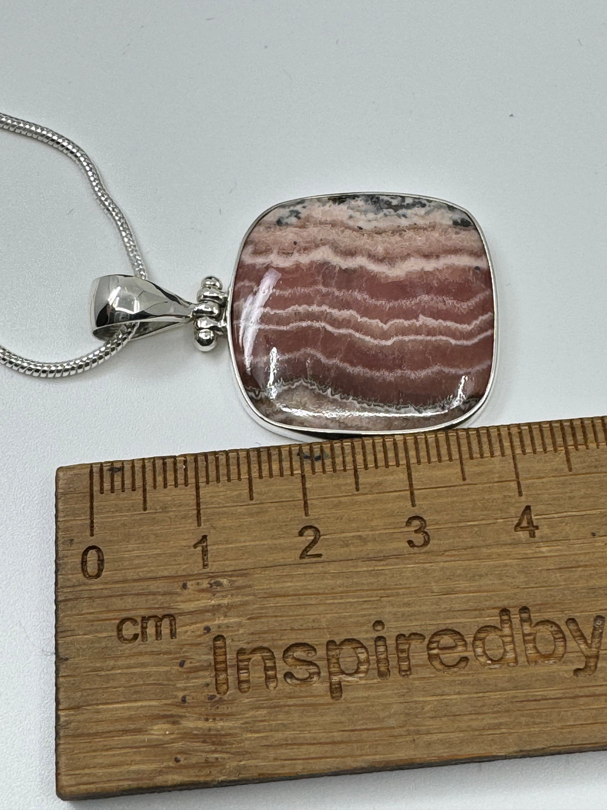 Rhodocroscite Silver Pendant- "My mind, body, and spirit are protected and grounded."