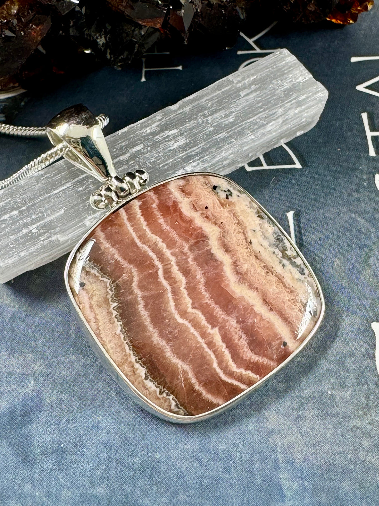 Rhodocroscite Silver Pendant- "My mind, body, and spirit are protected and grounded."