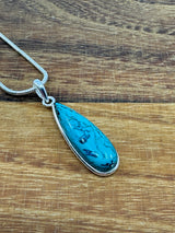 Turquoise Tibet Silver Pendant - "I express myself from a place of calmness, love, and truth."