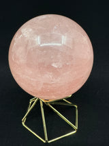 Rose Quartz Sphere on Gold Stand 370g- “I radiate love, beauty, confidence and grace”.