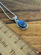 Labradorite Silver Pendant - “I welcome change and transformation into my life”.