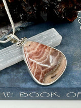 Rhodocroscite Silver Pendant- "My mind, body, and spirit are protected and grounded."