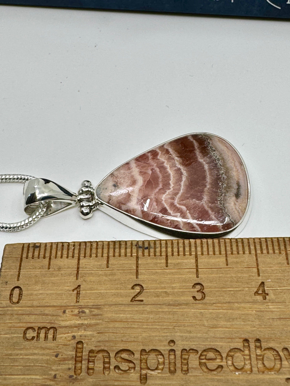 Rhodocroscite Silver Pendant- "My mind, body, and spirit are protected and grounded."