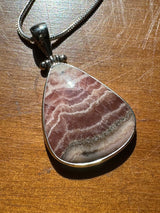 Rhodocroscite Silver Pendant- "My mind, body, and spirit are protected and grounded."