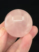 Rose Quartz Sphere on Crown Stand 95g- “I radiate love, beauty, confidence and grace”.