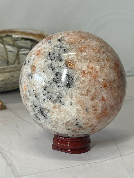 Sunstone Sphere 8.5cm - Leadership & Strength